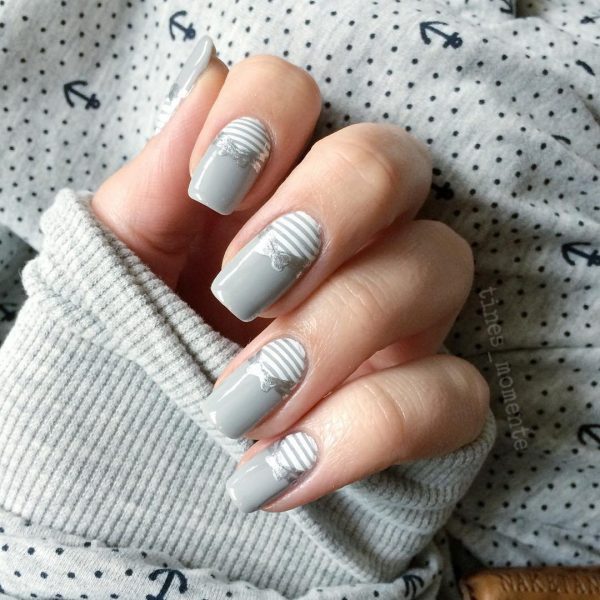 Ảnh mẫu nail xám đính nơ lạ mắt
