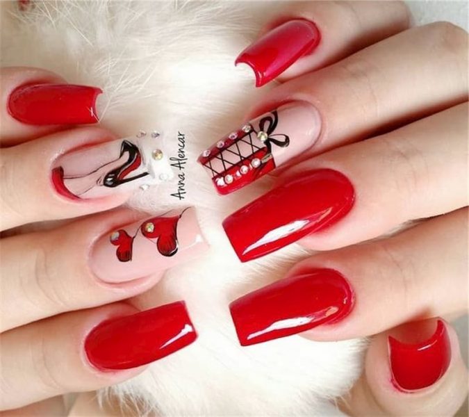 Hình ảnh mẫu nail màu đỏ tươi vẽ họa tiết